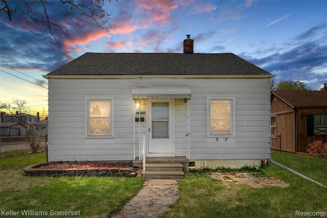 22005 Rausch Ave, Eastpointe, MI 48021 - bungalow-style house featuring a chimney and roof with shingles