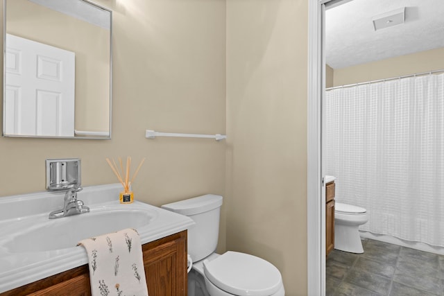 515 Georgetown Dr, Traverse City, MI 49684 - full bath featuring toilet, vanity, and curtained shower