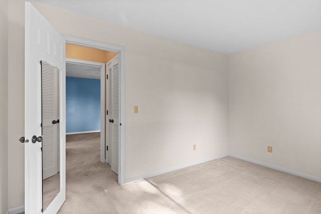 515 Georgetown Dr, Traverse City, MI 49684 - spare room with light colored carpet and baseboards