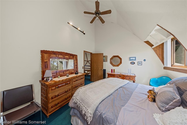 2637 E 7th Rd, Roscommon, MI 48653 - bedroom with carpet floors, high vaulted ceiling, and a ceiling fan