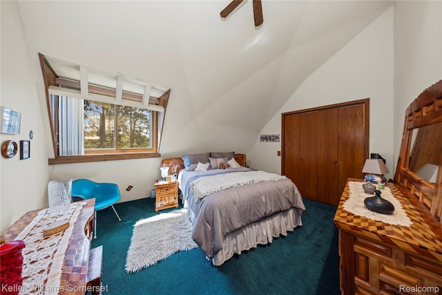 2637 E 7th Rd, Roscommon, MI 48653 - bedroom featuring dark colored carpet, vaulted ceiling, a closet, and ceiling fan