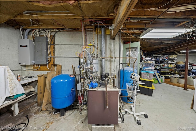 2637 E 7th Rd, Roscommon, MI 48653 - utility room featuring electric panel and a heating unit