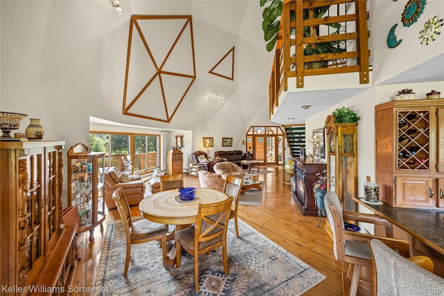 2637 E 7th Rd, Roscommon, MI 48653 - dining space with a towering ceiling and wood finished floors