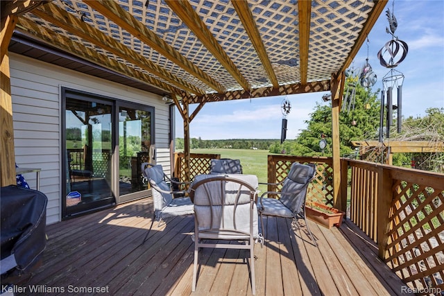 2637 E 7th Rd, Roscommon, MI 48653 - wooden terrace with outdoor dining space, a pergola, and a grill