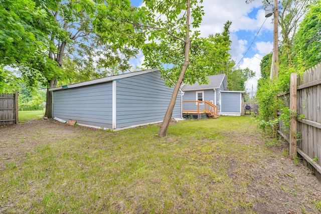1026 Jennings Ave, Benton Harbor, MI 49022 - view of yard with a deck and an outbuilding