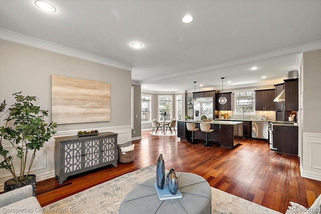 1419 Henrietta St, Birmingham, MI 48009 - living room featuring dark wood finished floors, crown molding, recessed lighting, and baseboards
