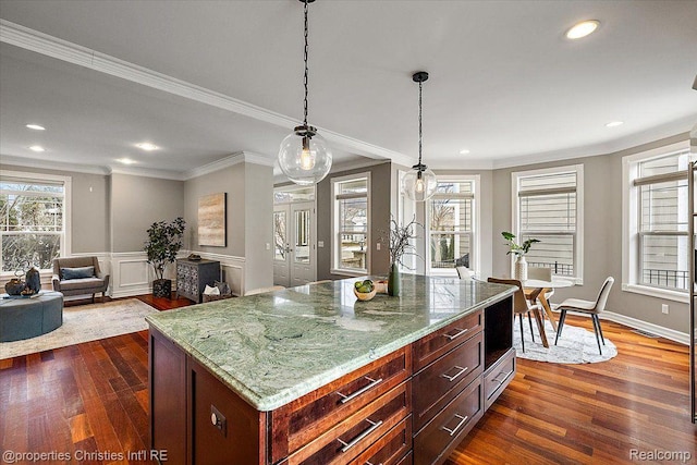 1419 Henrietta St, Birmingham, MI 48009 - kitchen with dark wood finished floors, ornamental molding, recessed lighting, light stone countertops, and hanging light fixtures