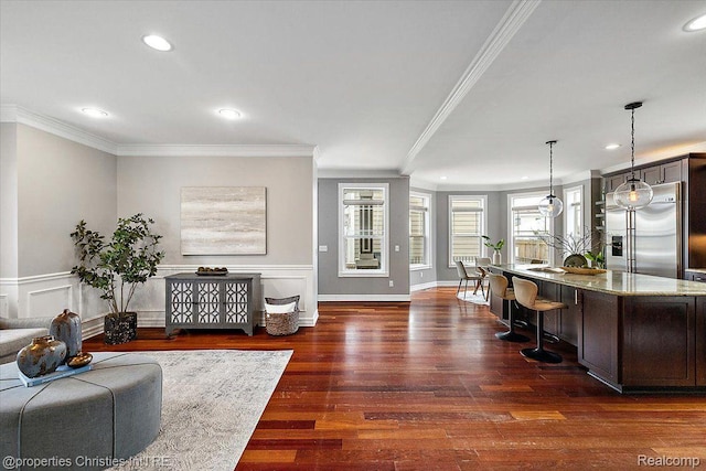 1419 Henrietta St, Birmingham, MI 48009 - living area featuring crown molding, recessed lighting, dark wood-style floors, and baseboards