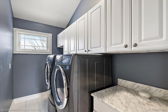 1419 Henrietta St, Birmingham, MI 48009 - washroom featuring cabinet space, independent washer and dryer, tile patterned flooring, and baseboards