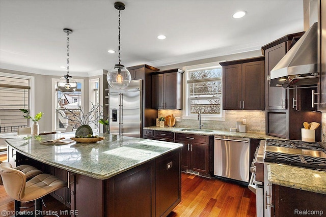 1419 Henrietta St, Birmingham, MI 48009 - kitchen featuring stainless steel appliances, a sink, crown molding, wall chimney exhaust hood, and dark wood-type flooring