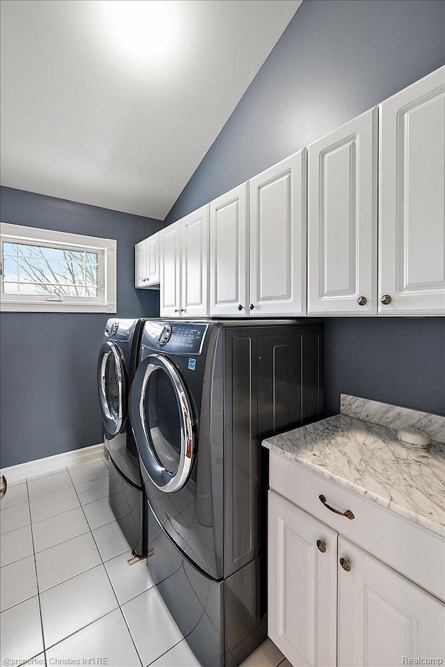 1419 Henrietta St, Birmingham, MI 48009 - washroom featuring cabinet space, independent washer and dryer, and light tile patterned floors