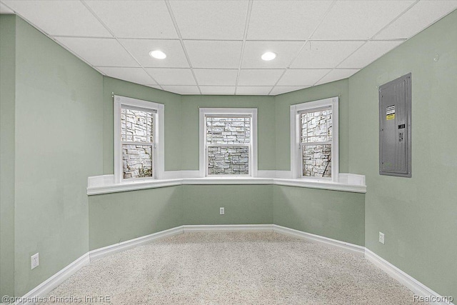 1419 Henrietta St, Birmingham, MI 48009 - empty room featuring a paneled ceiling, electric panel, baseboards, and recessed lighting