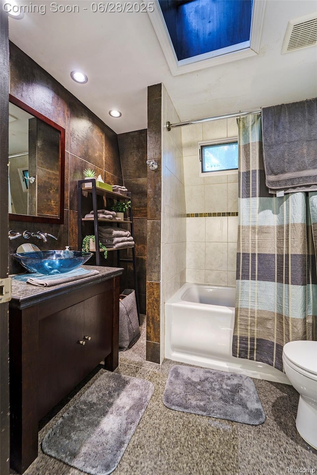 3030 Stanton Rd, Oxford, MI 48371 - full bathroom featuring vanity, shower / tub combo, recessed lighting, and tile walls