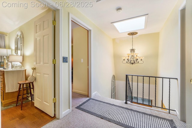 3030 Stanton Rd, Oxford, MI 48371 - hall featuring an upstairs landing, a chandelier, and carpet