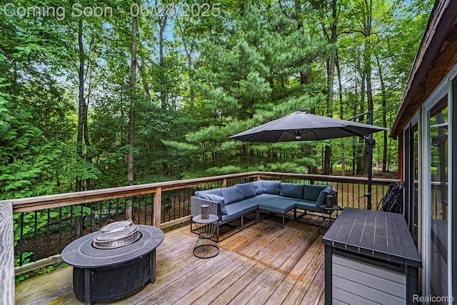 3030 Stanton Rd, Oxford, MI 48371 - deck with an outdoor living space with a fire pit