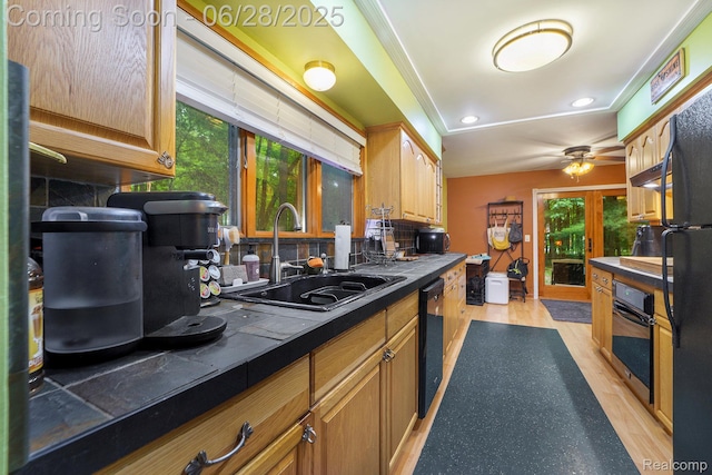 3030 Stanton Rd, Oxford, MI 48371 - kitchen featuring black appliances, backsplash, a ceiling fan, light wood-style flooring, and recessed lighting
