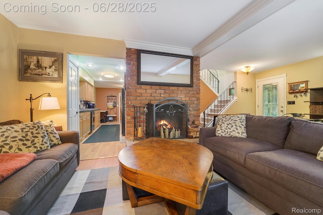 3030 Stanton Rd, Oxford, MI 48371 - living room with a fireplace, stairway, and light wood-type flooring