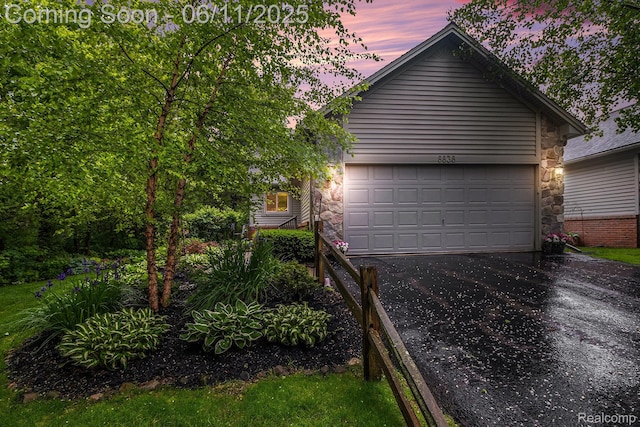8838 Cedar Ln, Clarkston, MI 48348 - garage with driveway