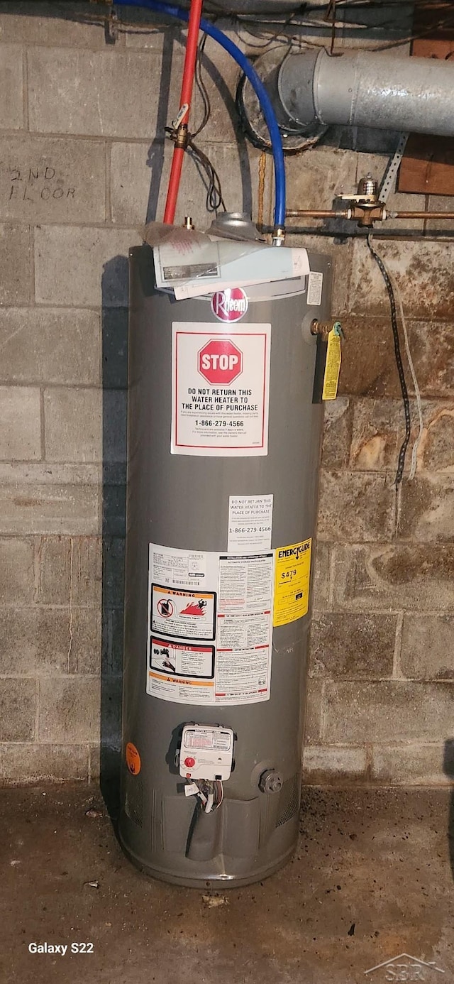 1701 Home Dr, Fairview, MI 48621 - utility room featuring water heater