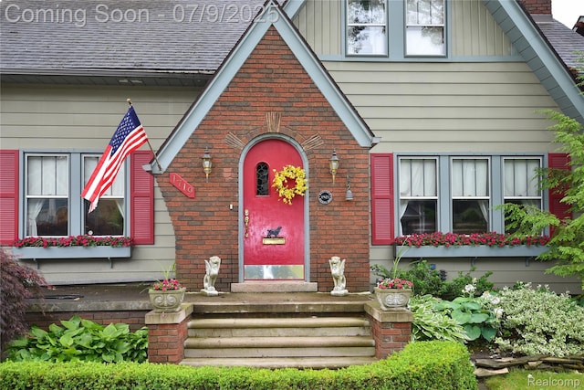 1719 Sycamore Ave, Royal Oak, MI 48073 - view of front of home with brick siding and roof with shingles