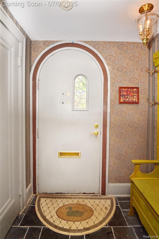 1719 Sycamore Ave, Royal Oak, MI 48073 - entrance foyer with wallpapered walls and arched walkways