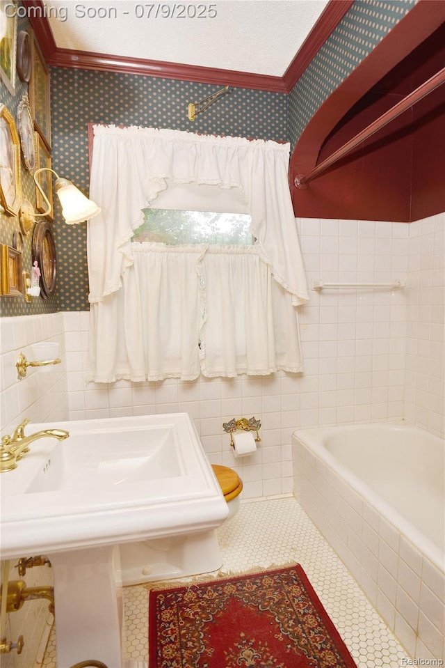 1719 Sycamore Ave, Royal Oak, MI 48073 - full bathroom with wallpapered walls, tiled bath, tile patterned flooring, tile walls, and ornamental molding