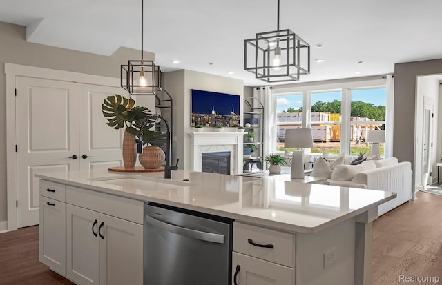 1778 Addison Cir, Walled Lake, MI 48390 - kitchen featuring dishwasher, open floor plan, light wood-type flooring, light countertops, and recessed lighting