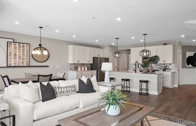 1778 Addison Cir, Walled Lake, MI 48390 - living area with a chandelier, recessed lighting, and dark wood-type flooring