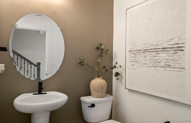 1778 Addison Cir, Walled Lake, MI 48390 - half bath featuring toilet and a sink
