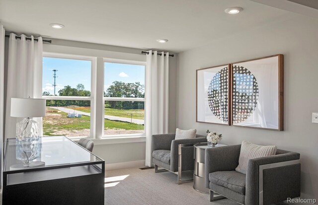 1778 Addison Cir, Walled Lake, MI 48390 - living area featuring light carpet, healthy amount of natural light, recessed lighting, and baseboards