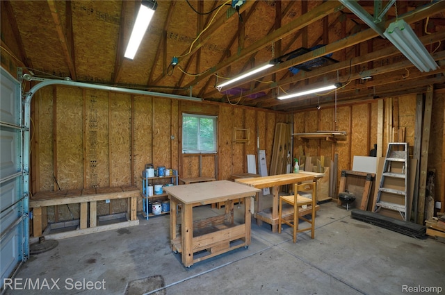 11468 Grand Oaks Dr, Clio, MI 48420 - garage with a workshop area
