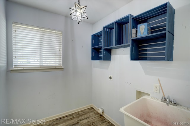 11468 Grand Oaks Dr, Clio, MI 48420 - washroom featuring wood finished floors, baseboards, and hookup for an electric dryer