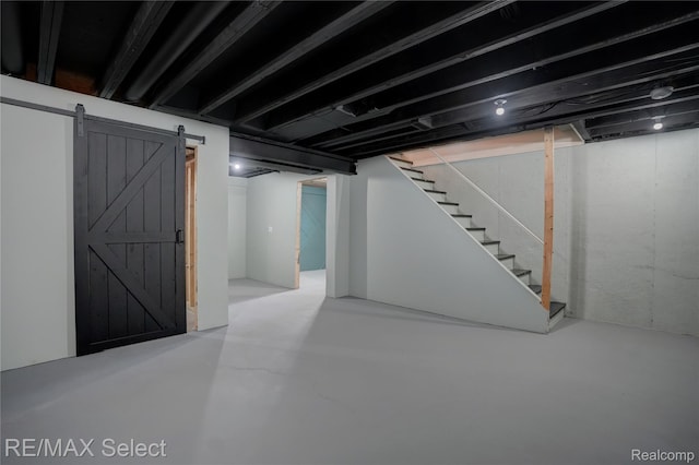 11468 Grand Oaks Dr, Clio, MI 48420 - finished below grade area featuring stairway and a barn door