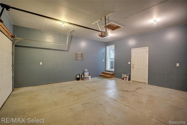 11468 Grand Oaks Dr, Clio, MI 48420 - garage with a garage door opener