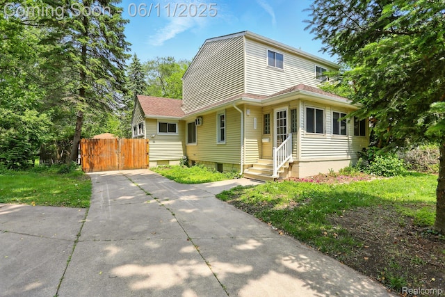 22521 Hoffman St, Saint Clair Shores, MI 48082 - traditional home with driveway and a shingled roof