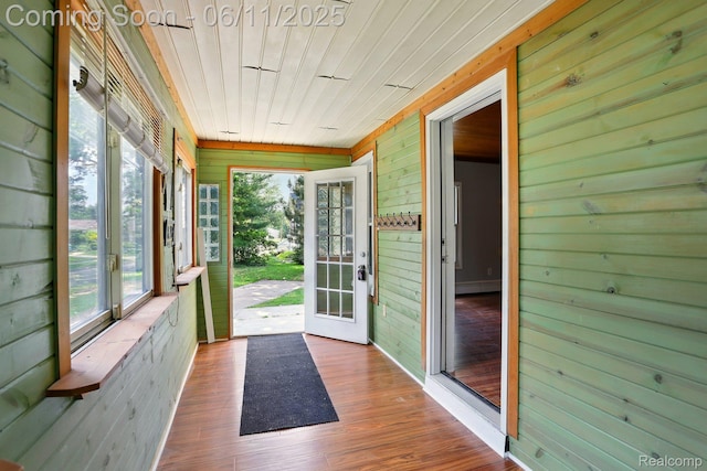 22521 Hoffman St, Saint Clair Shores, MI 48082 - unfurnished sunroom featuring wooden walls, wood finished floors, and wood ceiling