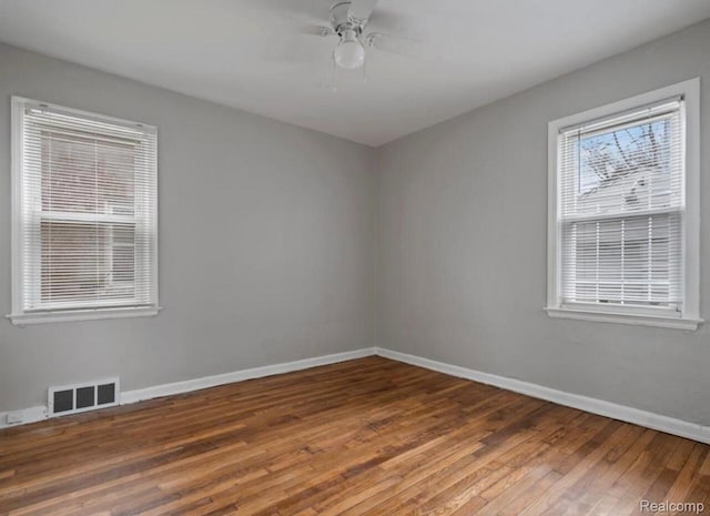 19611 Revere St, Detroit, MI 48234 - spare room with ceiling fan, wood finished floors, and baseboards