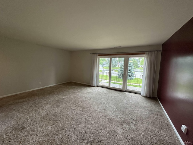 101 Provincial Ct, Saginaw, MI 48638 - carpeted empty room with baseboards