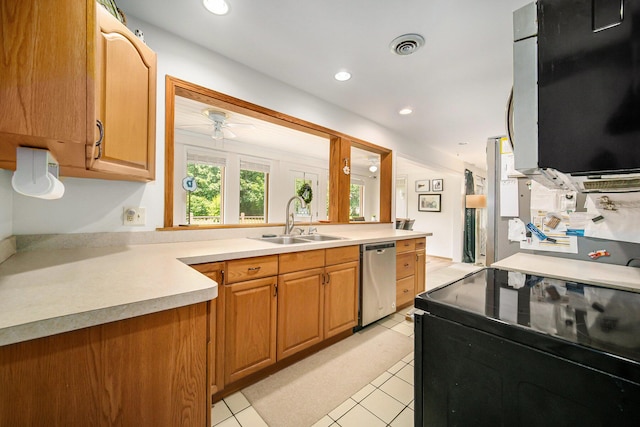 55 E Lewis Ave, Milan, MI 48160 - kitchen with stainless steel dishwasher, a sink, a ceiling fan, light countertops, and recessed lighting
