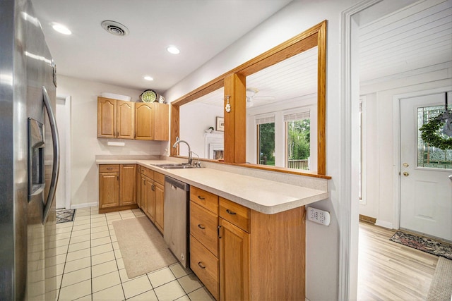 55 E Lewis Ave, Milan, MI 48160 - kitchen featuring stainless steel appliances, a sink, light countertops, plenty of natural light, and recessed lighting