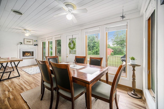 55 E Lewis Ave, Milan, MI 48160 - dining area with plenty of natural light, a ceiling fan, wooden ceiling, and light wood finished floors