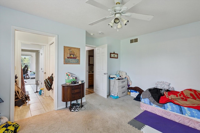 8078 S Royston Rd, Eaton Rapids, MI 48827 - bedroom with light carpet and ceiling fan