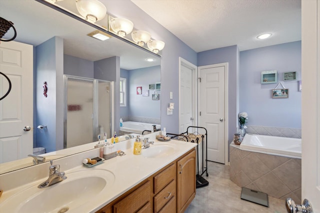 8078 S Royston Rd, Eaton Rapids, MI 48827 - bathroom with a stall shower, a bath, double vanity, and tile patterned floors