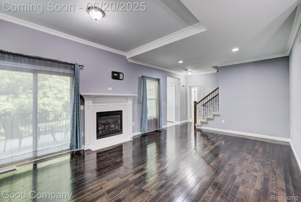 1724 Barrington Ct, Lake Orion, MI 48360 - unfurnished living room with healthy amount of natural light, stairs, wood finished floors, crown molding, and recessed lighting