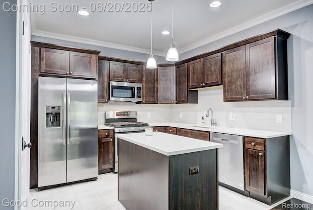 1724 Barrington Ct, Lake Orion, MI 48360 - kitchen with appliances with stainless steel finishes, dark brown cabinetry, ornamental molding, decorative light fixtures, and light countertops
