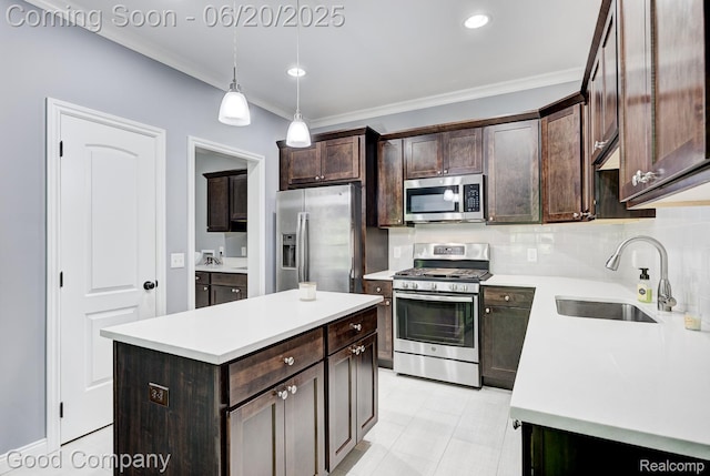 1724 Barrington Ct, Lake Orion, MI 48360 - kitchen with appliances with stainless steel finishes, dark brown cabinets, ornamental molding, light countertops, and decorative light fixtures