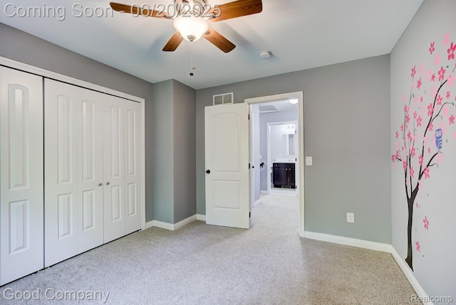 1724 Barrington Ct, Lake Orion, MI 48360 - unfurnished bedroom with carpet floors, a closet, and a ceiling fan