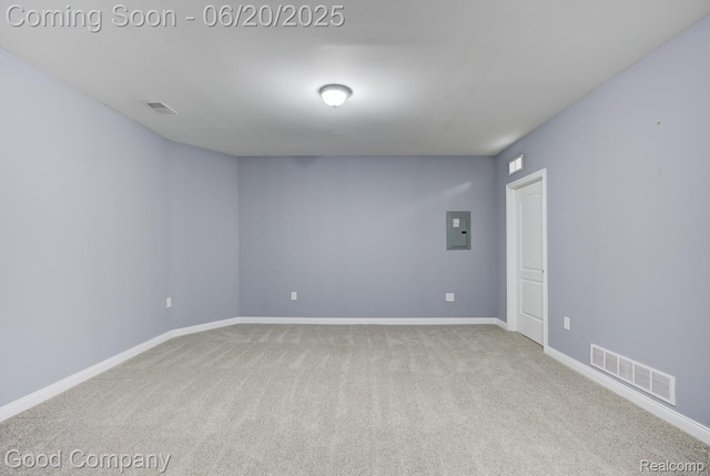 1724 Barrington Ct, Lake Orion, MI 48360 - carpeted empty room with electric panel and baseboards