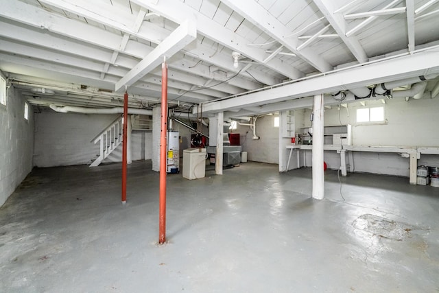 409 N Mechanic St, Berrien Springs, MI 49103 - below grade area featuring stairway and gas water heater
