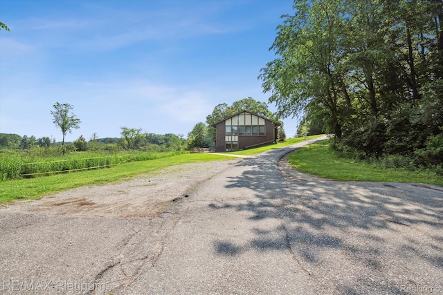 12132 Lexington Dr Unit 2, South Lyon, MI 48178 - view of asphalt driveway